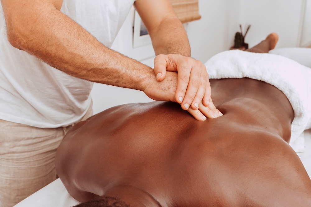Black,Man,Having,Back,Massage,In,The,Spa,Salon,After